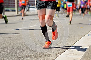 Marathon running race, people feet on road, sport concept