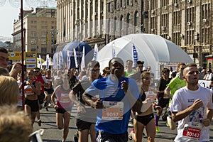 Marathon running race, people feet on road, sport, fitness and healthy lifestyle concept