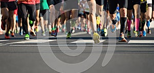 Marathon running race, runners feet on road