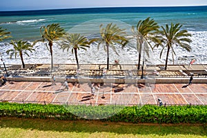 Marbella, Spain - April 5, 2023: Aerial view of the promenade along the ocean