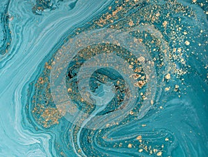 Marble abstract acrylic background. Blue marbling artwork texture. Golden glitter.