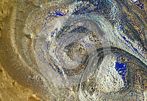 Marble abstract acrylic background. Blue marbling artwork texture. Golden glitter. Design, pale.