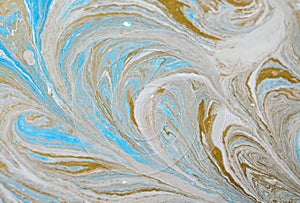 Marble abstract acrylic background. Blue marbling artwork texture. Golden glitter. Design, pale.