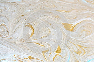 Marble abstract acrylic background. Blue marbling artwork texture. Golden glitter. Design, pale.