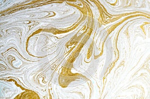 Marble abstract acrylic background. Blue marbling artwork texture. Golden glitter. Design, pale.