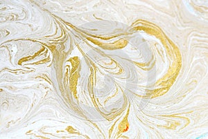 Marble abstract acrylic background. Blue marbling artwork texture. Golden glitter. Design, pale.