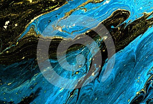 Marble abstract acrylic background. Blue marbling artwork texture. Golden glitter. Shine, creative.