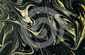 Marble abstract acrylic background. Marbling artwork texture. Agate ripple pattern. Gold powder. Grunge, leaf.