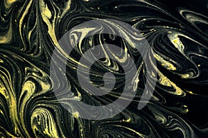 Marble abstract acrylic background. Marbling artwork texture. Agate ripple pattern. Gold powder. Grunge, leaf.