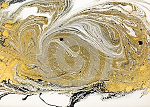 Marble abstract acrylic background. Nature black marbling artwork texture. Golden glitter.