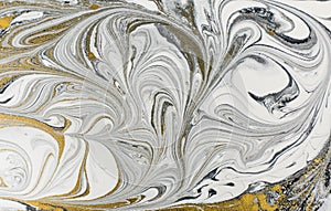 Marble abstract acrylic background. Nature black marbling artwork texture. Golden glitter.