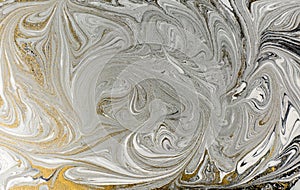 Marble abstract acrylic background. Nature black marbling artwork texture. Golden glitter.