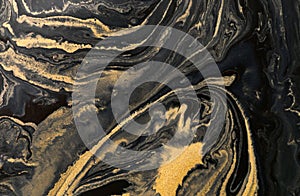 Marble abstract acrylic background. Nature black marbling artwork texture. Golden glitter. Surface, shine.