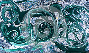 Marble abstract acrylic background. Nature blue and green marbling artwork texture. Gold and silver glitter.