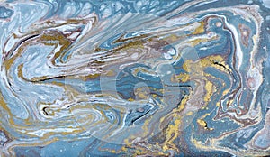 Marble abstract acrylic background. Nature blue marbling artwork texture. Gold glitter.