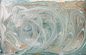 Marble abstract acrylic background. Nature blue marbling artwork texture. Golden glitter.