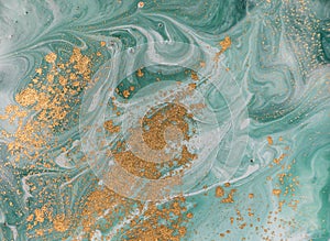 Marble abstract acrylic background. Nature green marbling artwork texture. Golden glitter.