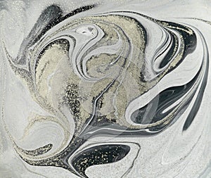 Marble abstract acrylic background. Nature marbling artwork texture. Golden glitter.