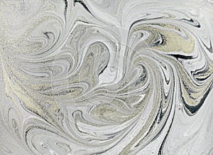 Marble abstract acrylic background. Nature marbling artwork texture. Golden glitter.