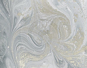 Marble abstract acrylic background. Nature marbling artwork texture. Golden glitter.