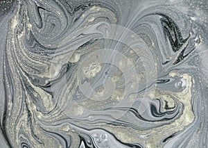 Marble abstract acrylic background. Nature marbling artwork texture. Golden glitter.