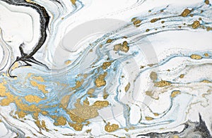 Marble abstract acrylic background. Nature marbling artwork texture. Golden glitter.