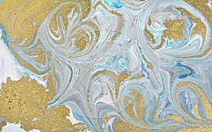 Marble abstract acrylic background. Nature marbling artwork texture. Golden glitter.