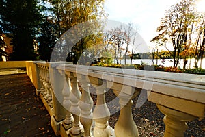Marble balcony railing in an old manor house in autumn