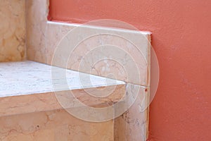 Marble baseboard at marble stairs. Closeup