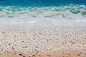 Marble Beach stones and waves in Thassos, Greece