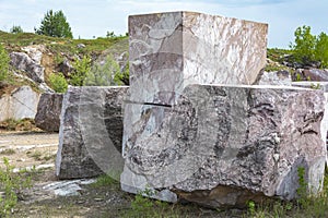 Marble blocks at an idle quarry near the village of Peteni photo