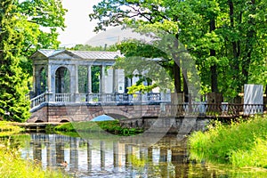 Marble bridge or Siberian Marble Gallery is decorative pedestrian roofed Palladian bridge gallery walkway in Catherine Park