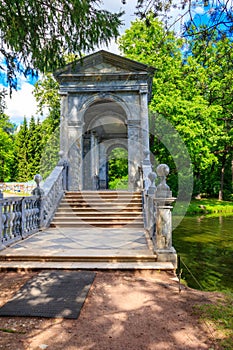 Marble bridge or Siberian Marble Gallery is a decorative pedestrian roofed Palladian bridge gallery walkway in Catherine Park