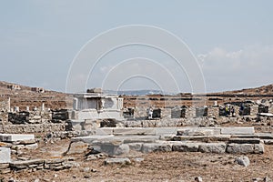 Marble bulls head on reconstructed section of the entablature, Stoa of Antigonos, Delos, Greece