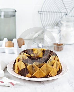 Marble Bundt Cake, Butter Cake with Vanilla and Chocolate Batter on Wooden Table