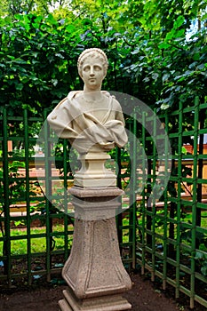 Marble bust of roman senator Marcellus Mark Claudius in old city park Summer Garden in St. Petersburg, Russia photo