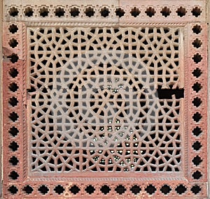 Marble carved window at Isa Khan Tomb