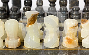 Marble Chessmen on a Chessboard