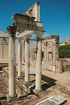 Marble columns and statues of Roman Forum building in Merida