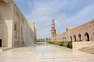 Marble courtyard and flanking minaret of a mosque