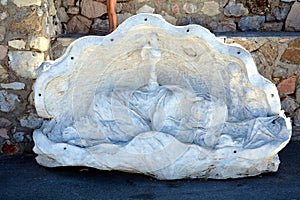 Marble female statue, Porto Azzurro, in Elba island, Italy photo