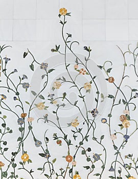 Marble flower form wall decorated inside of Sheikh Zayed Grand Mosque with blue sky in the morning at Abu Dhabi, UAE