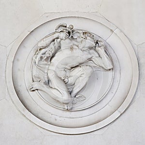 Marble fresque on the Milan's main railway station. Urban architectural photography.