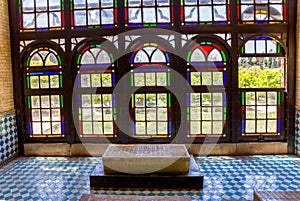 Marble grave by the windows
