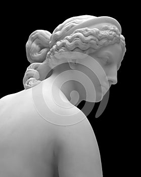 Marble head sculpture of young woman, ancient Greek goddess art bust statue isolated on black background