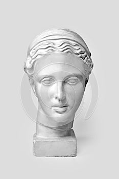 Marble head of young woman, ancient Greek goddess bust. Sculpture executed in accordance with modern standards of beauty photo