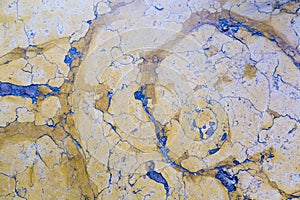 Marble with painted blue cracks texture