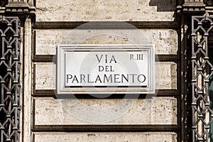 Marble plate with Street name via del Parlamento- engl: parliament street - at the wall in Rome photo