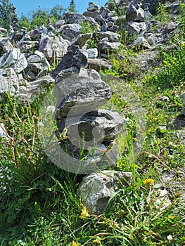 A marble pyramid built on the slope of the White Mountain to fulfill a wish in the Ruskeala Mountain Park on a sunny summer day