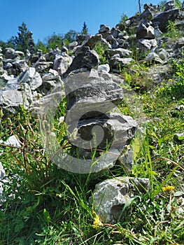 A marble pyramid built on the slope of the White Mountain to fulfill a wish in the Ruskeala Mountain Park on a sunny summer day